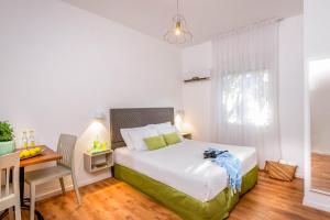 Postel nebo postele na pokoji v ubytování Travel Hotel Eilon