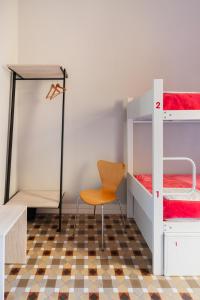 Postel nebo postele na pokoji v ubytování Red Nest Hostel