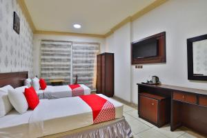 Giường trong phòng chung tại فندق الريان