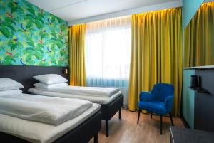 Postel nebo postele na pokoji v ubytování Thon Hotel Alta