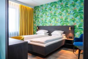 Postel nebo postele na pokoji v ubytování Thon Hotel Alta