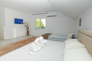 Voodi või voodid majutusasutuse Mokka House toas