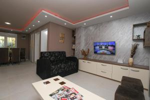 TV a/nebo společenská místnost v ubytování Mokka House