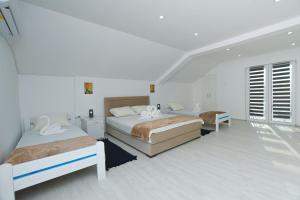 Voodi või voodid majutusasutuse Mokka House toas