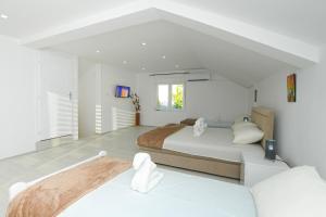Voodi või voodid majutusasutuse Mokka House toas