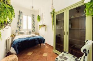 A bed or beds in a room at La Casa de Lope de Rueda