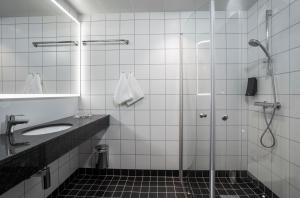 Koupelna v ubytování Thon Hotel Alta