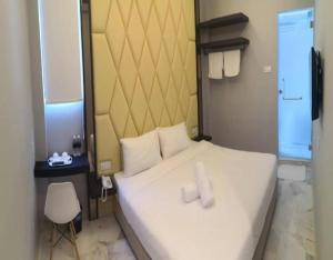 Postel nebo postele na pokoji v ubytování Suite Dreamz Hotel Banting