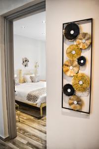 A bed or beds in a room at Naxos Enjoy Apartments