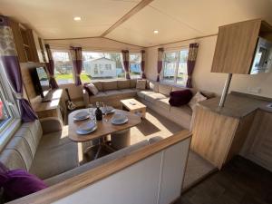 an aerial view of a living room in a camper van at Lakes Breaks - 6 Meadows in Tattershall