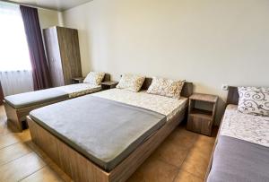 Postel nebo postele na pokoji v ubytování База отдыха Горный Орел