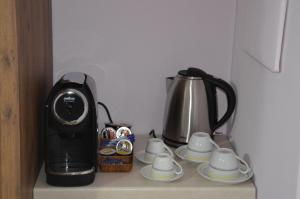 Kohvi ja tee valmistamise võimalus majutusasutuses I fiori del Pollino - Guest House