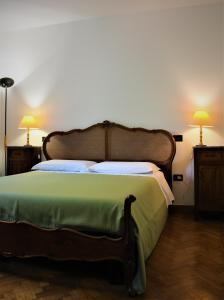 Łóżko lub łóżka w pokoju w obiekcie La Tinaia Country House