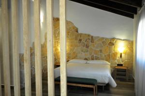 Lova arba lovos apgyvendinimo įstaigoje Hostal Restaurante Villa de Brihuega