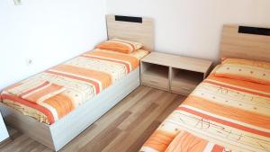 Postel nebo postele na pokoji v ubytování Kirovi House - guest rooms