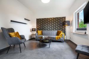 Χώρος καθιστικού στο Ferienhaus-Nordseebirke