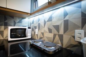Η κουζίνα ή μικρή κουζίνα στο Flat Beverly Hills 307 +5 φωτογραφίες