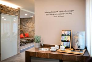 A seating area at JUFA Hotel Eisenerzer Ramsau