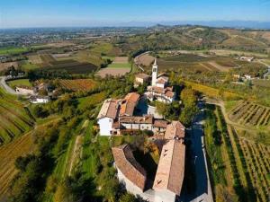 an aerial view of a small village with a church at Alla Torre Antica in Ruttàrs