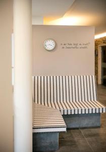 A seating area at JUFA Hotel Eisenerzer Ramsau