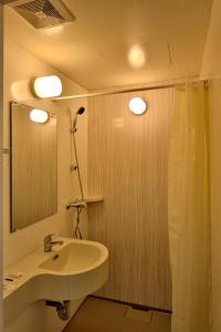Vannituba majutusasutuses Zodiak MT Haryono by KAGUM Hotels