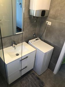 Kúpeľňa v ubytovaní Apartment Lea + 37 fotografií