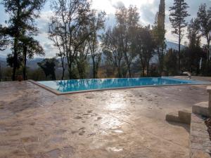 a swimming pool in the middle of a yard at Villa Ortensia D'Avalos in Alvignano