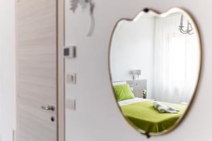 Postel nebo postele na pokoji v ubytování Le Calette Rooms - Puglia Mia Apartments