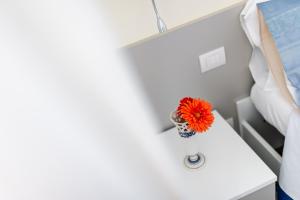 Postel nebo postele na pokoji v ubytování Le Calette Rooms - Puglia Mia Apartments