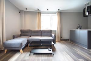 Posedenie v ubytovaní Apartament Antracytowy Darłówko