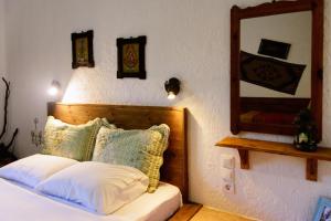 Кровать или кровати в номере Spiros Rooms