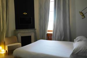 Postelja oz. postelje v sobi nastanitve Hotel Belle-Vue Vieux-Port