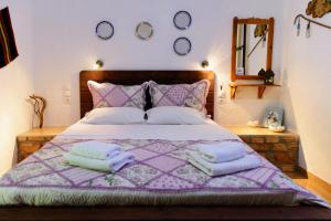 Кровать или кровати в номере Spiros Rooms
