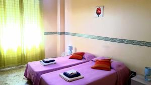 Postel nebo postele na pokoji v ubytování Vista Mare Rooms