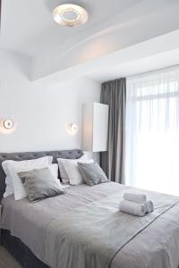 Ένα ή περισσότερα κρεβάτια σε δωμάτιο στο Aba Luxury Studio Spa n Pool Beach resort +29 φωτογραφίες