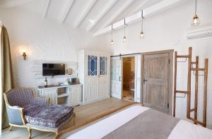 Kuchyň nebo kuchyňský kout v ubytování Alakapi Hotel & Villas