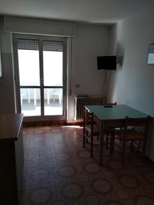 TV a/nebo společenská místnost v ubytování Residence Danubio