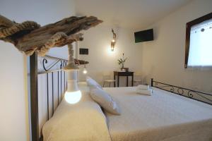 Ліжко або ліжка в номері Il RosAle a Celle Ligure