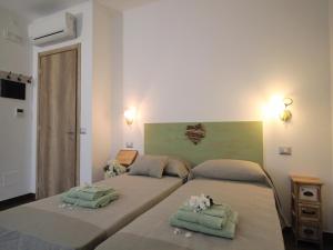 Posteľ alebo postele v izbe v ubytovaní Il RosAle a Celle Ligure