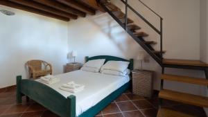 Postel nebo postele na pokoji v ubytování Welcomely - Mediterranea