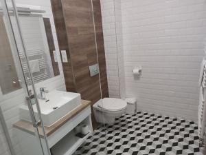 Kúpeľňa v ubytovaní Androméda Apartman