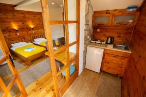 Kuchyň nebo kuchyňský kout v ubytování Apartments Tango