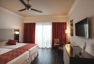 Postel nebo postele na pokoji v ubytování Hotel Riu Monica - Adults Only
