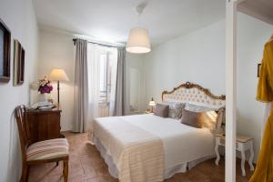 Postel nebo postele na pokoji v ubytování Scacciapensieri Guest House