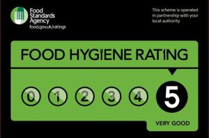 a green sign with the words food hygiene rating at FSC Dale Fort Hostel in Haverfordwest