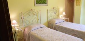 เตียงในห้องที่ Agriturismo Il Casale Pica