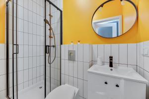 Kúpeľňa v ubytovaní Apartamenty Świętej Barbary + 37 fotografií