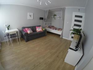 Ruang duduk di Apartament pod Ratuszem
