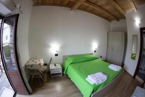 Cama ou camas em um quarto em San Giuseppe