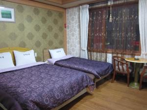 Photo de la galerie de l'établissement Jeju Olleh Hotel, à Jeju